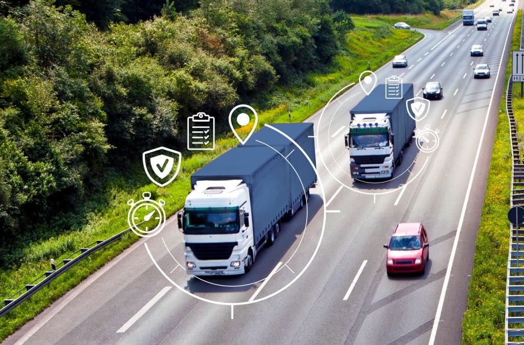 Caminhões e carros na estrada com ícones de localização por GPS